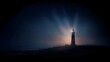 © Thares2020 - A solitary lighthouse stands tall on a rocky coast casting its guiding beam into the misty night sky filled with stars