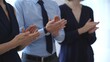 © rogerphoto - Business audience hands clapping, showing appreciation and success in a corporate meeting, celebrating achievement and positive feedback at a professional event