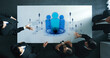 © InfiniteFlow - A group of business professionals engages in a collaborative meeting, showcasing teamwork and innovative ideas with digital elements in a modern workspace environment. Trope