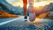 © Gzvzattio - Close-up of a person running on a paved road surrounded by mountains during sunrise or sunset, evoking determination and energy
