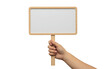 © MDSHAHINUL - Hand holding a blank wooden framed sign isolated on white background
