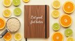 © Pixelia - A wooden notebook with healthy eating text surrounded by fruits