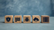 © Art_spiral - Wooden cubes with cybersecurity icons shield firewall bug cloud lock and server for data protection network security privacy compliance and infrastructure management