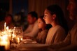 © Larisa - Warm glow from candles illuminates faces during intimate family gathering, celebrating traditions