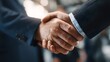 © Warakorn - Business partners shaking hands polished elegant corporate tone
