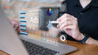 © Supapich - Businessman online advertising digital marketing strategy data analysis dashboard information report corporate e-business business technology concept