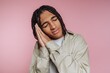 © bodnarphoto - Young Man Mimicking Sleep on Pink Background