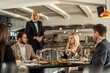 © Creative Light - Restaurant diners complain to a waitress about their meal