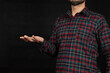 © Alejandro Bernal - a man wearing a lumberjack shirt ready to holding or receiving something at the right side of the screen