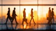 © Generative AI - Silhouetted Business Professionals Commuting in Modern Office Building at Sunrise, Symbolizing Success and Corporate Mobility