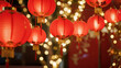 © HunterSnap - An abstract, blurred background of festive red and gold bokeh lights from lanterns and decorations