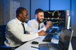 © Serhii - This is success. Two happy traders or financial analysts in the office celebrating a winning deal