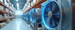 © Vadym - Industrial refrigeration equipment in warehouse. Conditioner units with blue fans on shelves. Storage room for frozen food with cold storage units. Refrigeration system for plant. Blurred background