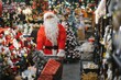 © Serhii - Santa claus choosing christmas decorations and gifts in store