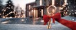 © VictoriaEmerson - Golden house key with red ribbon in front of a modern home during snowfall