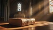 © MEO - Antique Bible on a wooden table inside a church with sunlight