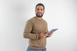 © Jerry PhotoRaw - Smiling Man Holding Tablet Looking at Camera