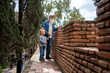 © sutulastock - Grandfather and grandson exploring ancient ruins together