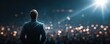 © Jiraporn - Back view of motivational speaker on stage concept. Business leader giving inspiring speech to large audience.