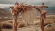 © Jiraporn - Boho style wedding arch with dream catchers in early autumn concept. A beautifully decorated wedding arch with flowers and macrame.