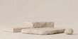 © shahpng - Minimalist neutral stone and textured organic shapes arranged on a plain background for product display and cosmetic presentation