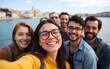 © bai - Group of happy tourists taking a photo of themselves in lisbon, portugal. High quality