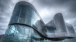 © Yuwarin - museum with curved steel and glass design, cloudy sky