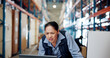 © peopleimages.com - Confused woman, shipping and logistics with laptop in storage warehouse for supply chain error. Female person, distributor or concern with wrong order for stock, poor inventory or fail in depot