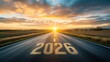 ©  US DESIGN HUB - Road to 2026 with sunrise, symbolizing new beginnings and future goals on asphalt highway