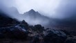 © Thares2020 - Dramatic mountain landscape shrouded in thick fog and mist with rugged rocky terrain in the foreground