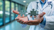 © Fiaz - Doctor's hands holding puzzle pieces, symbolizing medical solutions and healthcare integration