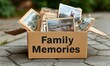 © Road Red Runner - A close-up view of a cardboard box labeled Family Memories filled with vintage photographs