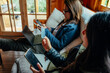 © Luis Herrera/Stocksy - Mother With Daughter Laying On The Couch At Home.