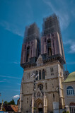 Zagreb, Croatia – July 18, 2025: The iconic Zagreb Cathedral under extensive restoration, with scaffolding surrounding its twin towers.
