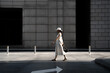 © Makingultimate Xiao/Stocksy - woman walking