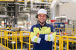 © Hernandez & Sorokina/Stocksy - Smiling Technician Portrait in Power Plant