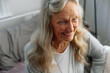 © Rob and Julia Campbell/Stocksy - Elderly woman with a joyful expression