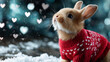 © O - Cute rabbit in red Christmas sweater sitting in snow with heart bokeh background. Festive animal for holiday greeting card.