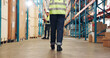 © ChasingMagic25/peopleimages.com - Legs, walk and inspection at warehouse, logistics and shelf with career, storage or back for safety check. Person, supply chain and cargo for inventory management, export or job at shipping company