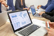 © Anna Berkut/Stocksy - data analytics dashboard, charts on screen during business meeting