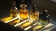 © irawan - Four ornate glass containers holding golden liquid sit bathed in dramatic sunlight creating strong shadows.