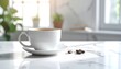 © Diva - A white cup of coffee on a marble counter with coffee beans and out-of-focus greenery and sunlight in background
