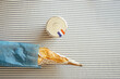 © TrueShot | Westend61 - French baguette and marmalade on striped table with copy space