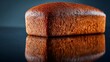 © fivan - A loaf on reflective glass surface, modern minimalist twist