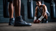© INT888 - Boxing shoes training fitness athlete gym workout punching bag focus determination sports