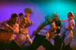 © master1305 - Group of street dancers moving in colorful motion blur. Concept of urban lifestyle, teamwork, and youth culture visuals for creative campaigns, entertainment, and advertising design.