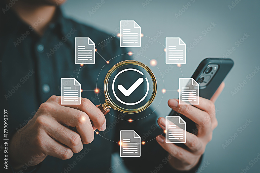 Document verification approval process with magnifying glass and ...