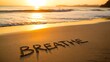 © Billing  - Word breathe written in sand on beach at sunset symbolizing calm and relaxation