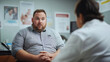 © Nina - European obese man discusses health concerns with doctor in medical office during a consultation, with informational posters in the background. Fight against obesity. With copy space