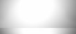 © Valiantsina - Clean minimalistic background with smooth gradient lighting, transitioning from light gray to white. Abstract empty studio backdrop with a soft shadow floor effect, creating depth and simplicity.